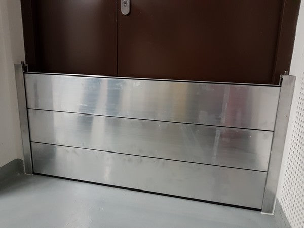internally mounted flood barrier